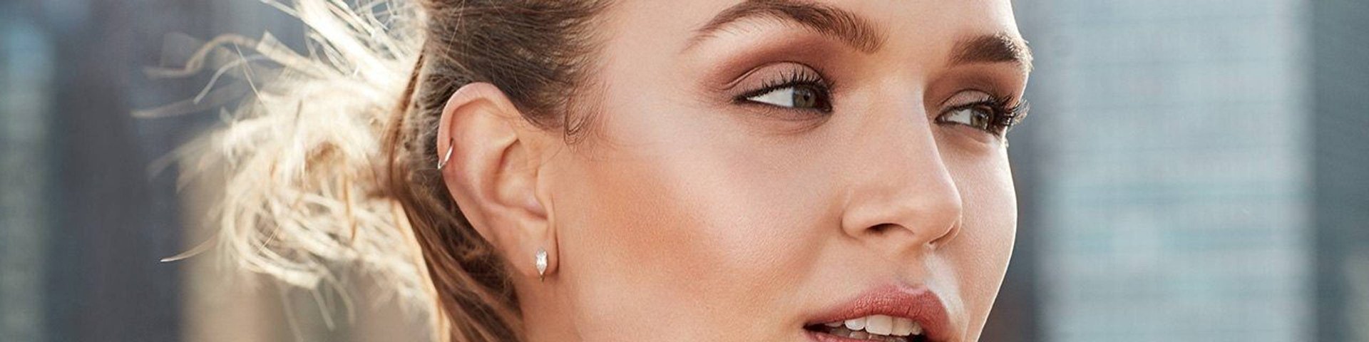 Maybelline Blush and Bronzer products illustrative banner image - Close up of green eyed model 